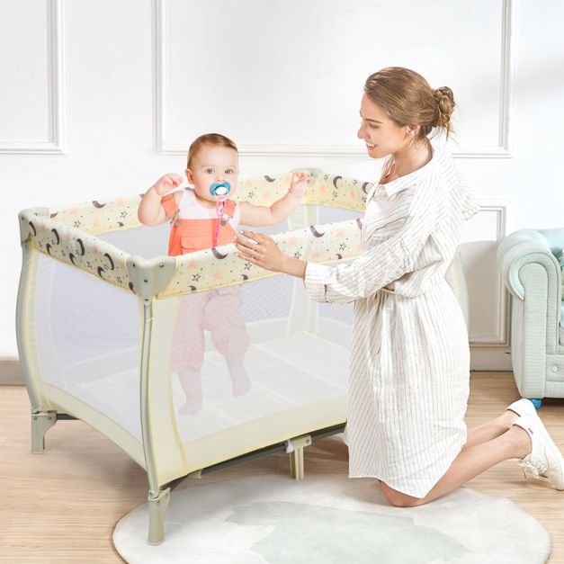3 in 1 Convertible Bassinet Cot with Changing Table and Toy Bar